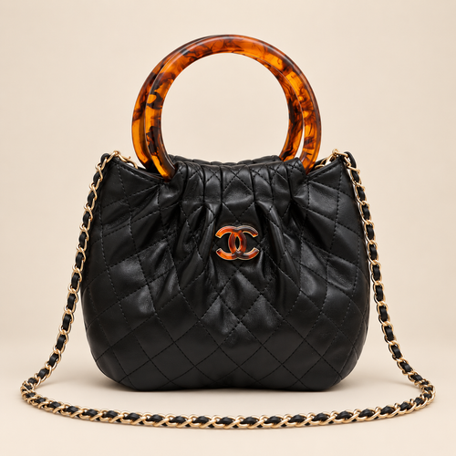 Chanel quilted resin ring top handle bag in black